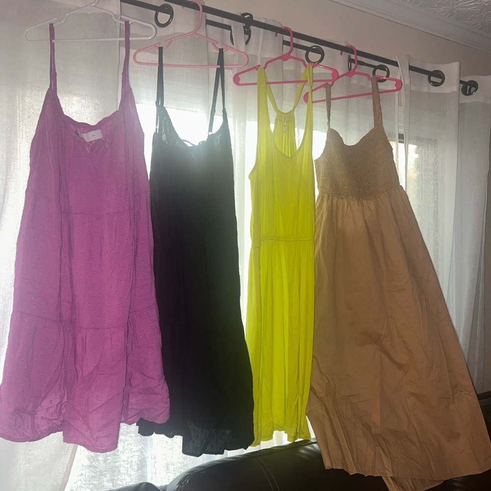 Set of Four Dresses in Purple, Black, Yellow, and Tan